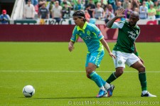 Sounders v Timbers: Fredy Montero dribbles past Songo'o